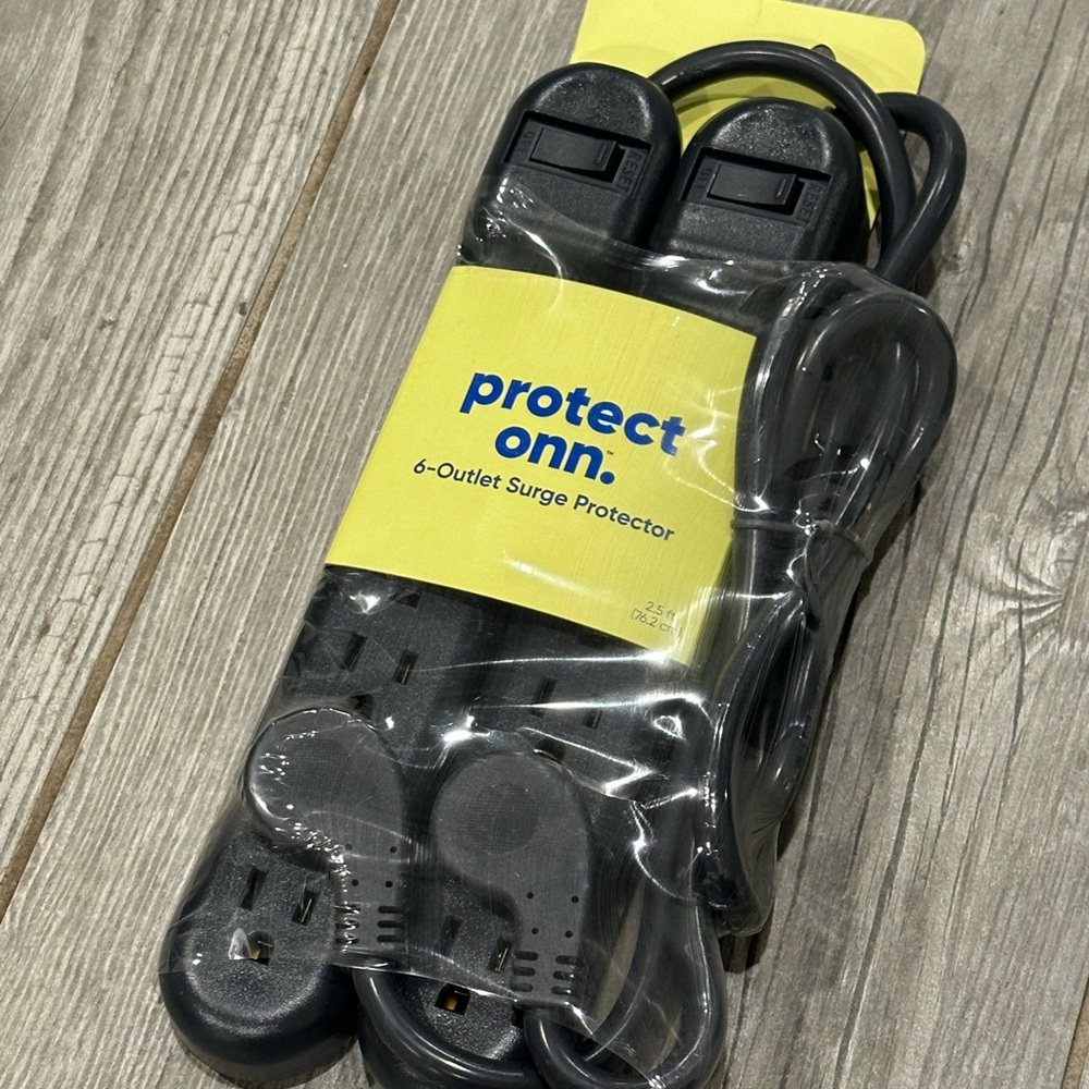 On Running Black Compact Surge Protector for Computers